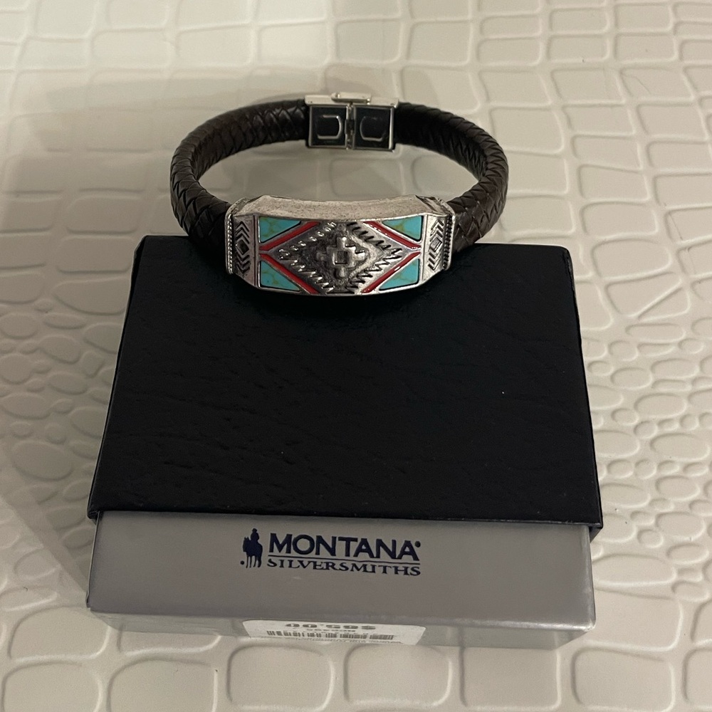 **Sold**. Montana Silversmiths turquoise black mens leather bracelet